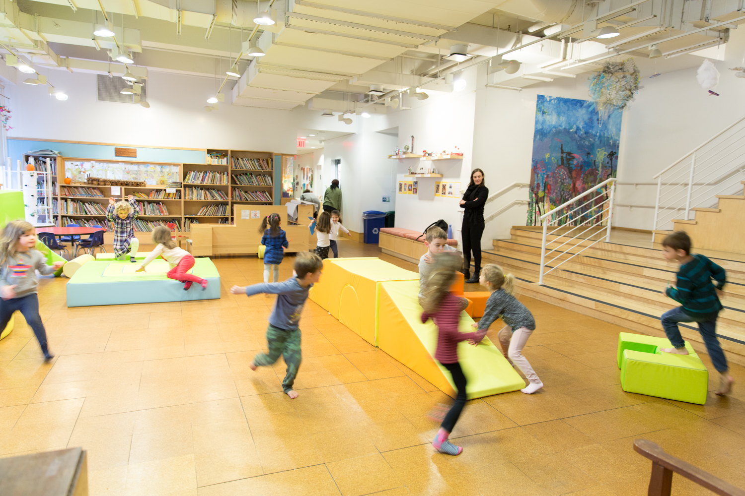 children running around with obstacles