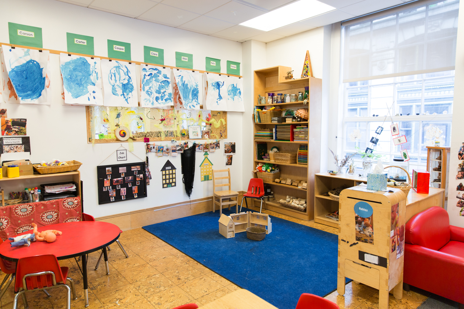 classroom with paintings on the wall