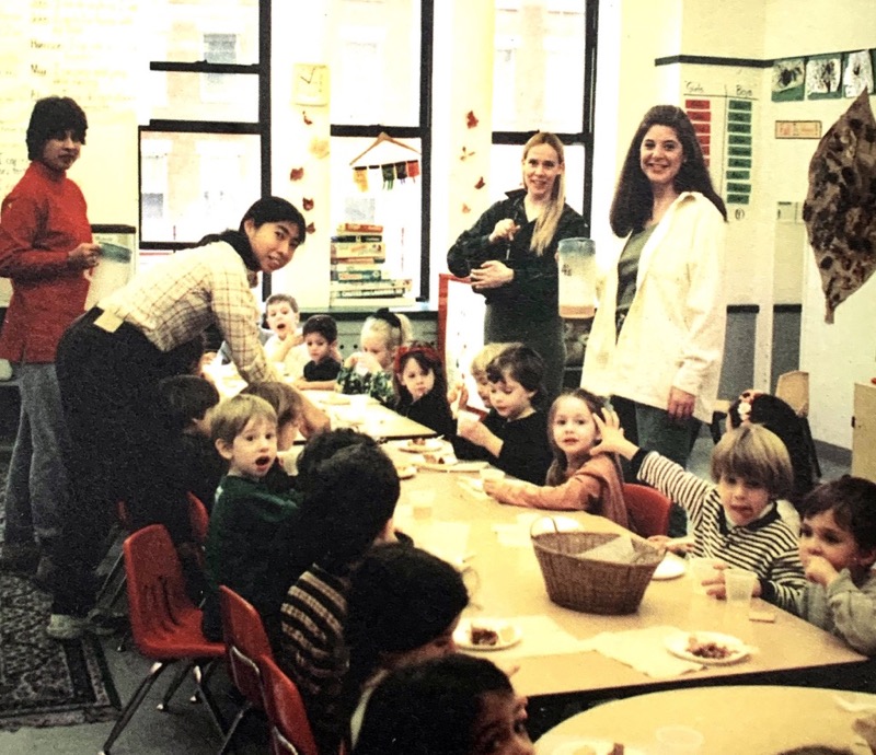 group of teachers and students at tables