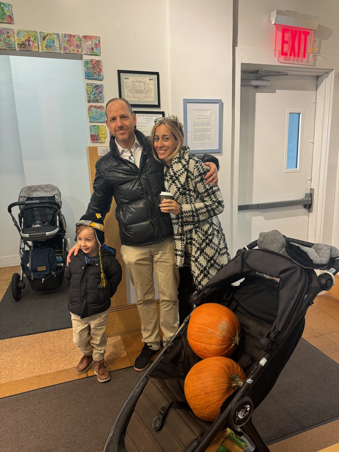 parents dropping off a child at school