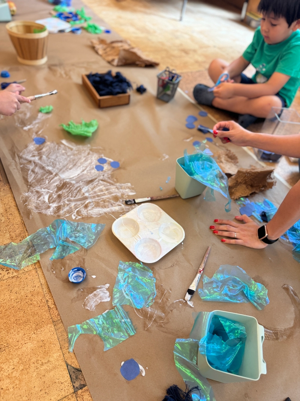 children painting on the floor
